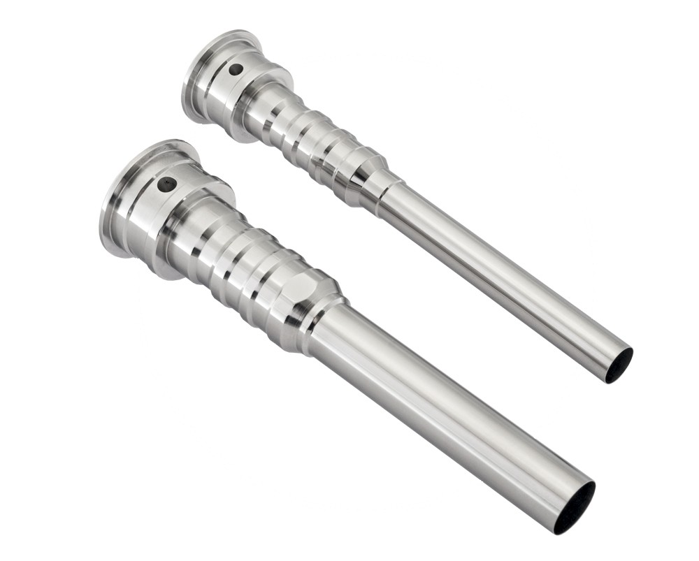 Syringe stopper guide tubes for sterile machines